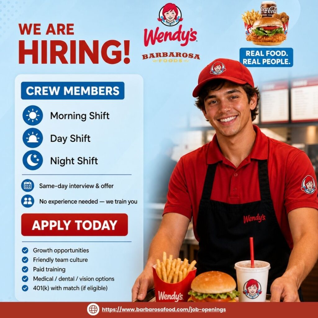 Smiling Wendy's crew member in red uniform and cap holding food order — Barbarosa Foods now hiring for morning, day, and night shifts with same-day interviews